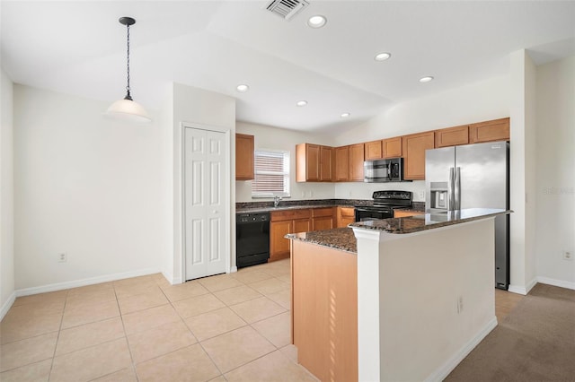 kitchen with a center island, dark stone countertops, decorative light fixtures, lofted ceiling, and black appliances