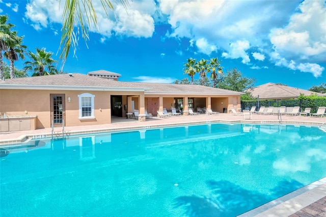 view of pool featuring a patio