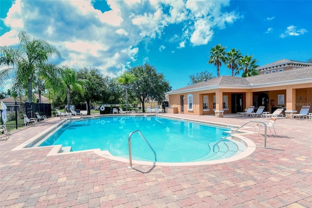 view of swimming pool featuring a patio