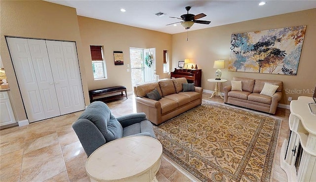 living room with ceiling fan