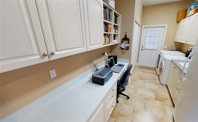 office space with washing machine and dryer and built in desk