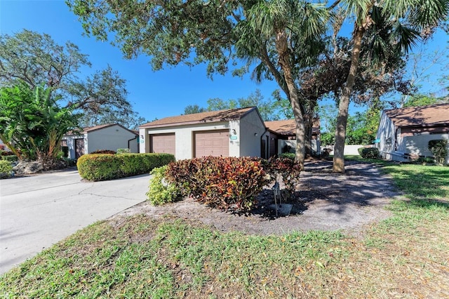 view of property exterior with a garage