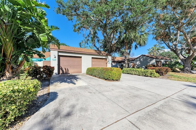 view of side of home with a garage