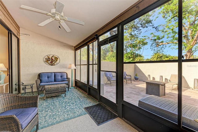 sunroom with vaulted ceiling and ceiling fan