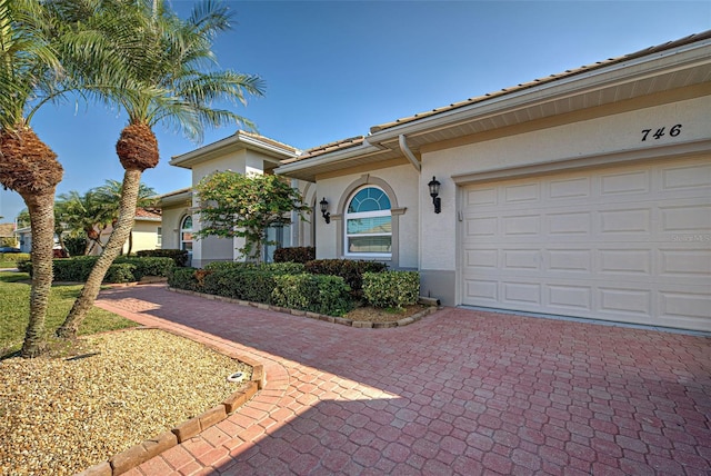 view of front of home with a garage