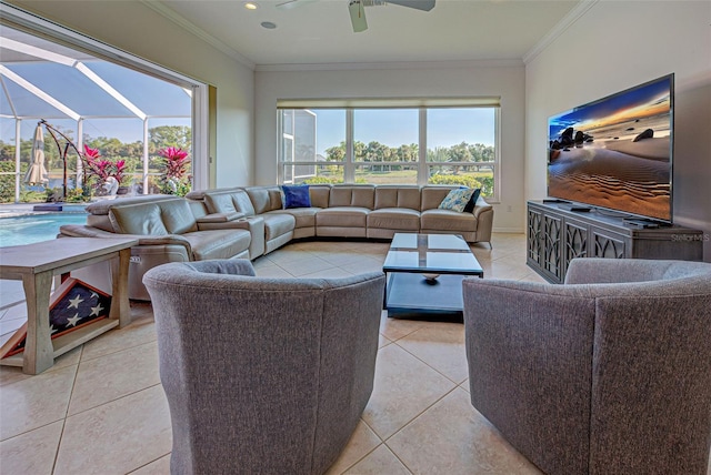 living room featuring crown molding, ceiling fan, and light tile patterned floors