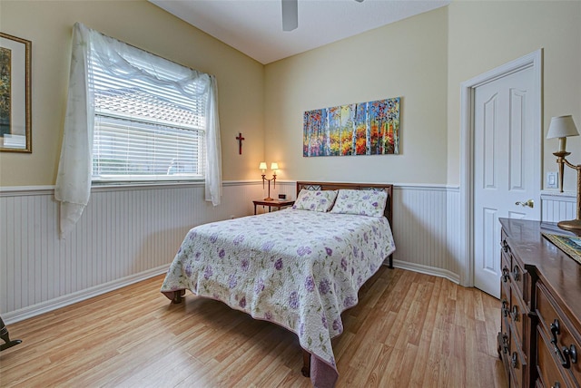 bedroom featuring a closet, ceiling fan, and light wood-type flooring