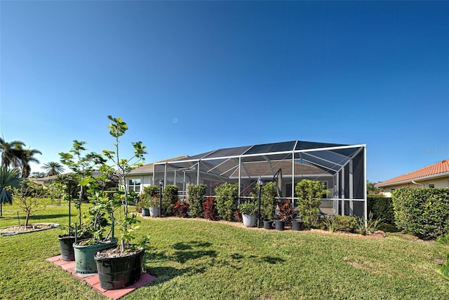 view of yard with a lanai