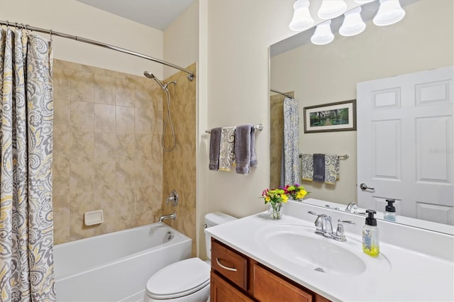 full bathroom featuring shower / tub combo, vanity, and toilet