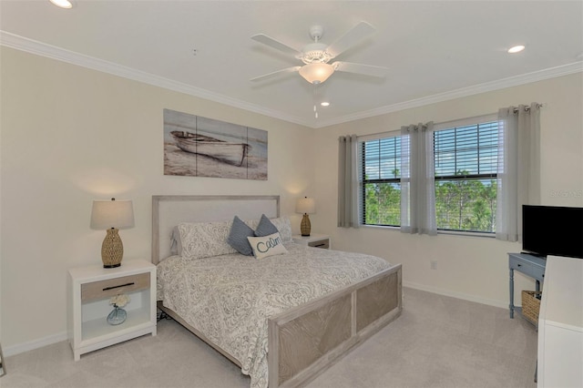 bedroom featuring ceiling fan, light colored carpet, and crown molding