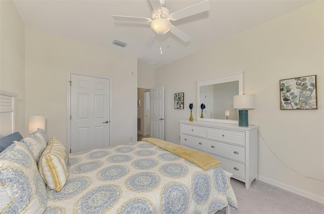 bedroom featuring ceiling fan and light colored carpet