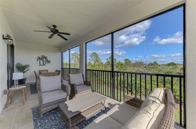 sunroom / solarium with ceiling fan