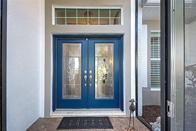 view of exterior entry with french doors