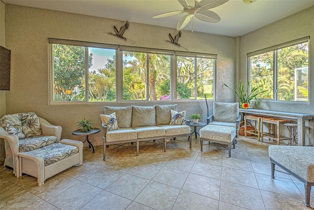 sunroom with ceiling fan