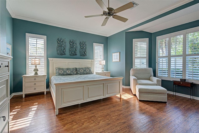 bedroom featuring ceiling fan, dark hardwood / wood-style flooring, and crown molding