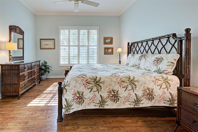 bedroom featuring wood-type flooring, ceiling fan, and crown molding