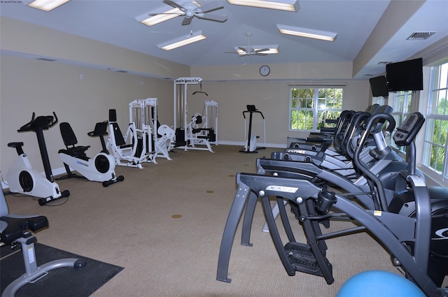 gym with ceiling fan and vaulted ceiling