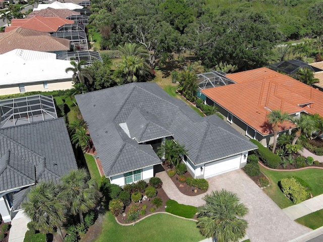 birds eye view of property with a residential view
