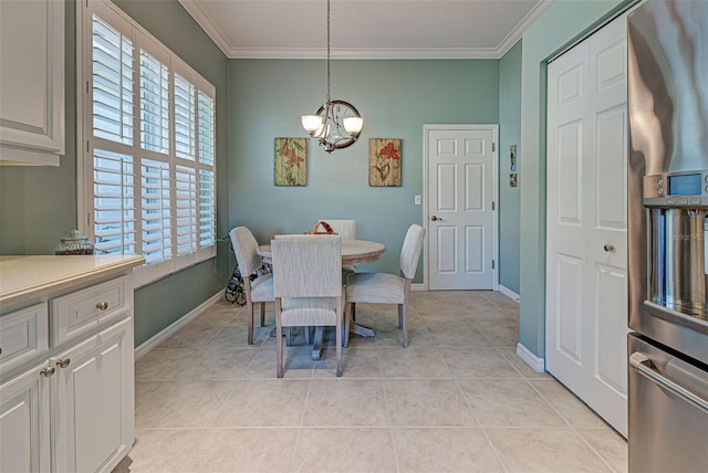 dining area with baseboards, an inviting chandelier, ornamental molding, and light tile patterned floors
