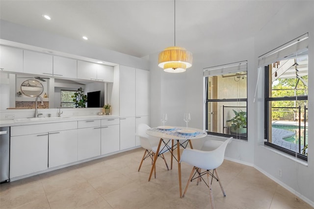 dining room featuring sink