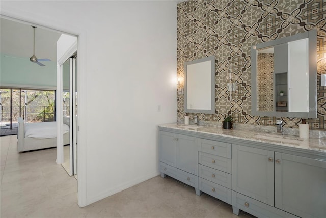 bathroom featuring vanity and ceiling fan