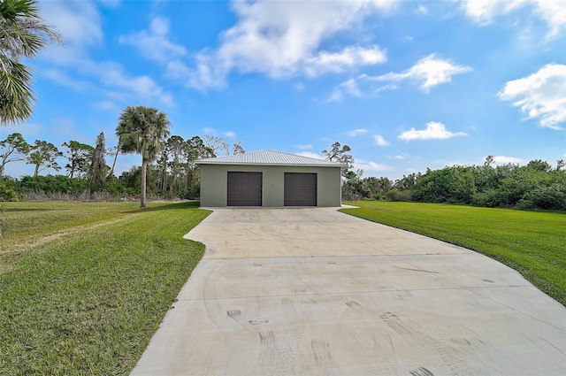 garage with a yard