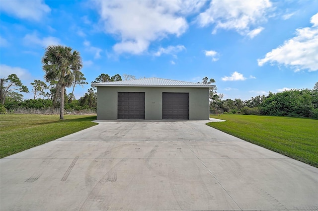 garage with a lawn