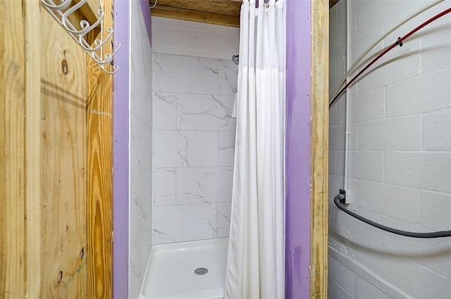 bathroom with a shower with shower curtain