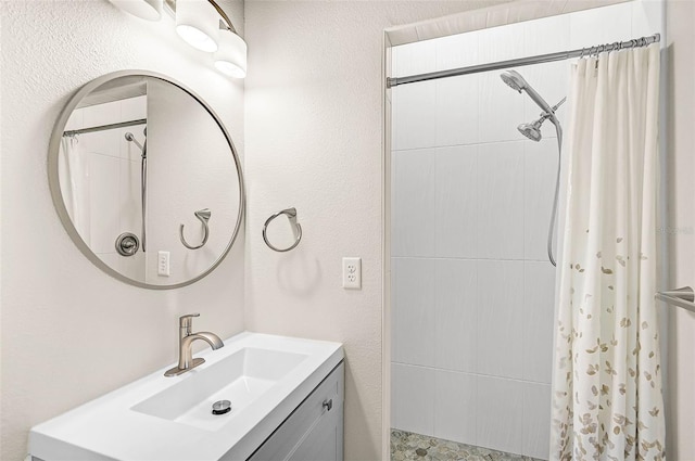 bathroom with vanity and a shower with shower curtain