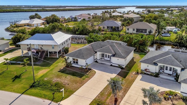 bird's eye view with a water view