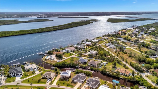 birds eye view of property featuring a water view