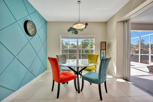 dining area with light tile patterned floors