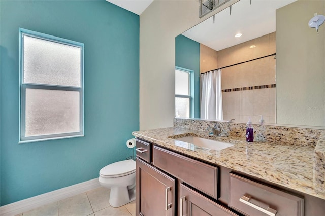 bathroom featuring vanity, tile patterned flooring, a shower with shower curtain, and toilet