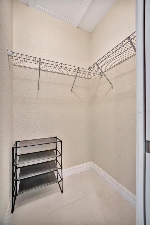 walk in closet featuring tile patterned floors