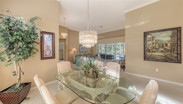 carpeted dining area with ornamental molding