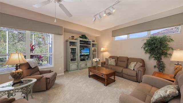 275 Royal Oak Way, Venice, FL 34292 - living area with light carpet, a ceiling fan, and rail lighting