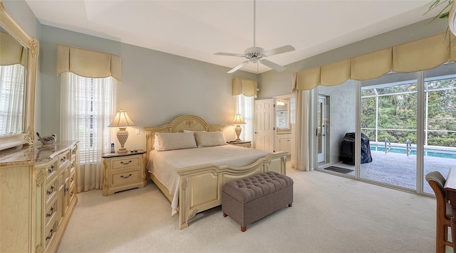 carpeted bedroom featuring access to outside and ceiling fan