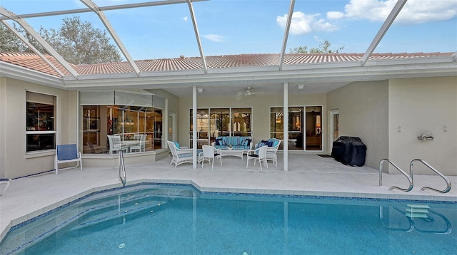 275 Royal Oak Way, Venice, FL 34292 - swimming pool featuring area for grilling, ceiling fan, glass enclosure, outdoor lounge area, and a patio area