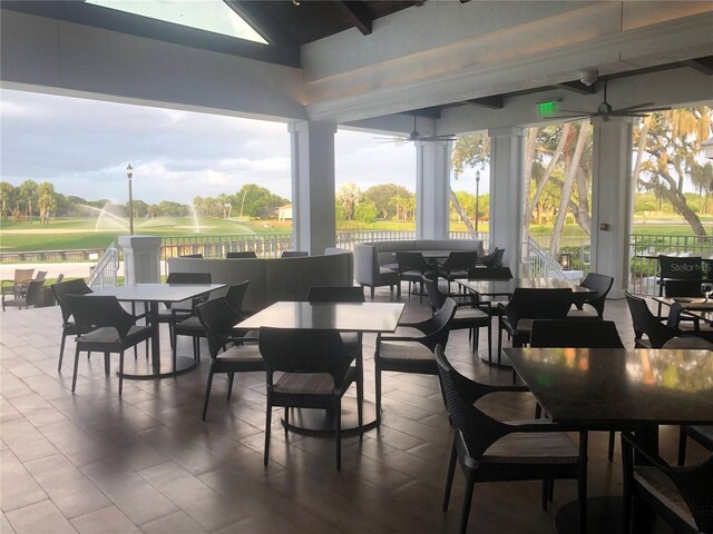 275 Royal Oak Way, Venice, FL 34292 - view of patio / terrace featuring outdoor dining space, golf course view, and a ceiling fan