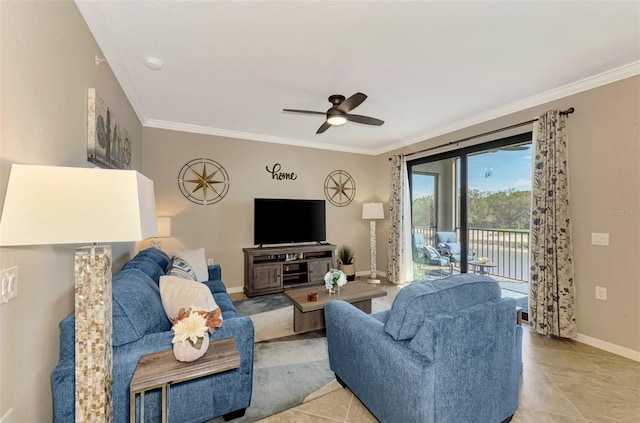 tiled living room featuring ceiling fan and crown molding