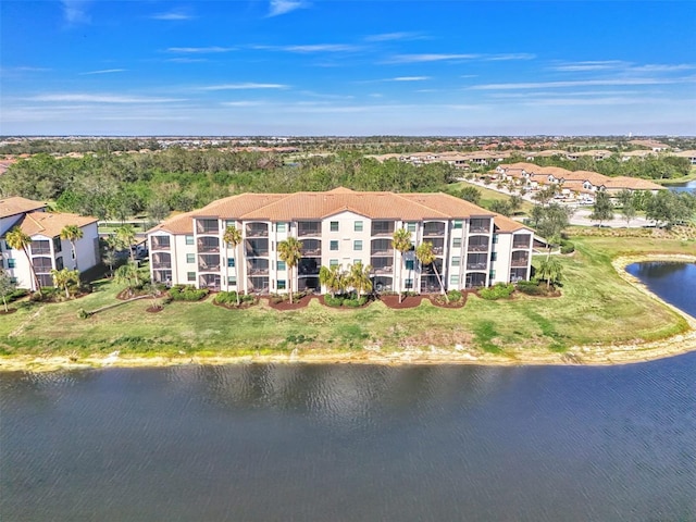 drone / aerial view with a water view