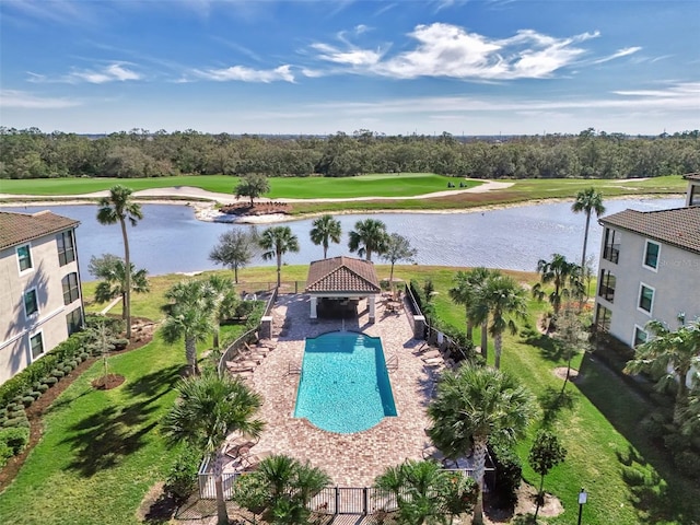 birds eye view of property with a water view