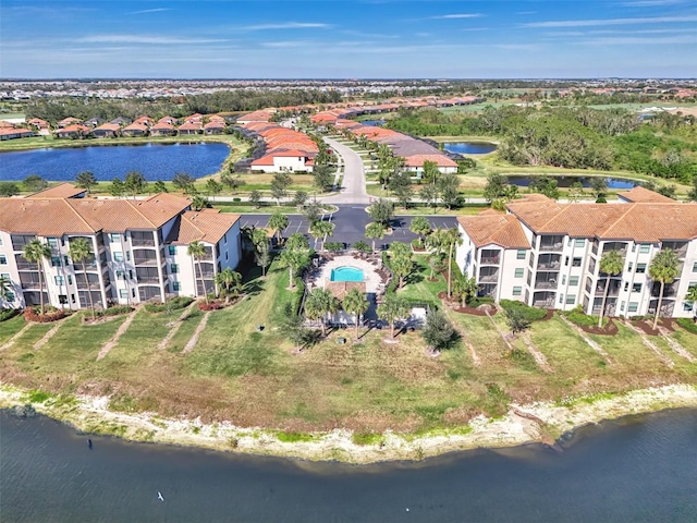 bird's eye view with a water view