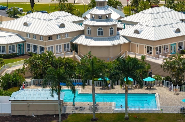 view of swimming pool with a patio area