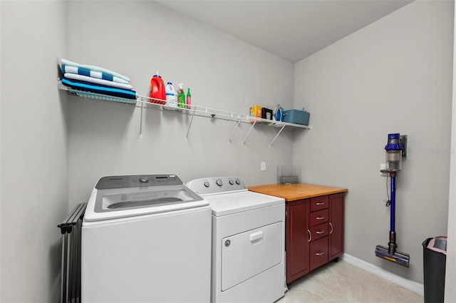 laundry room featuring washer and clothes dryer