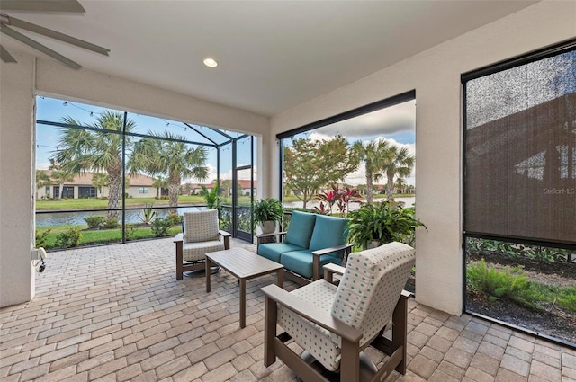 sunroom with a water view