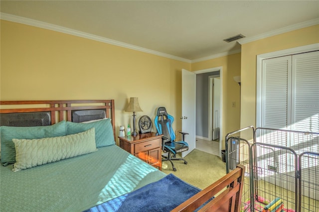 carpeted bedroom featuring a closet and ornamental molding