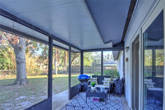 sunroom with vaulted ceiling