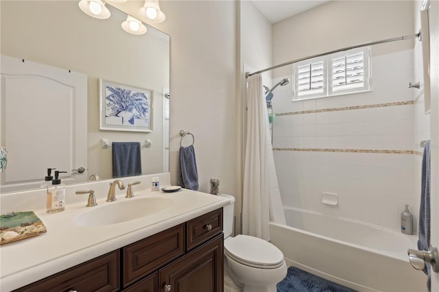 full bathroom featuring shower / bath combo, toilet, and vanity