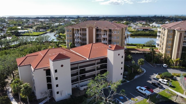 drone / aerial view with a water view